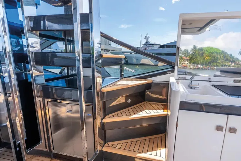 No Name Yacht Photos Pics Luxurious 2019 Azimut S7 yacht interior with sleek staircase and modern design elements.