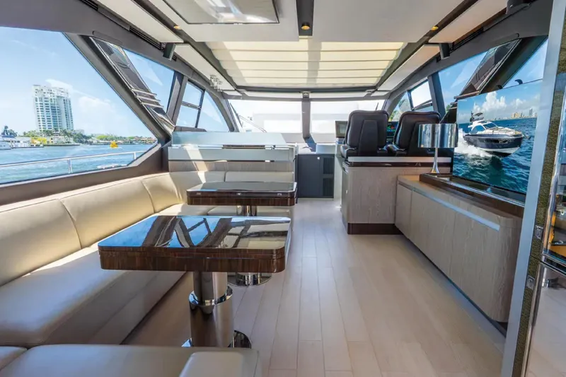 No Name Yacht Photos Pics Luxurious interior of a 2019 Azimut S7 yacht with modern furnishings and panoramic windows.