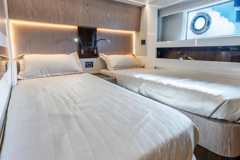 No Name Yacht Photos Pics Luxurious 2019 Azimut S7 yacht cabin with twin beds and modern lighting.