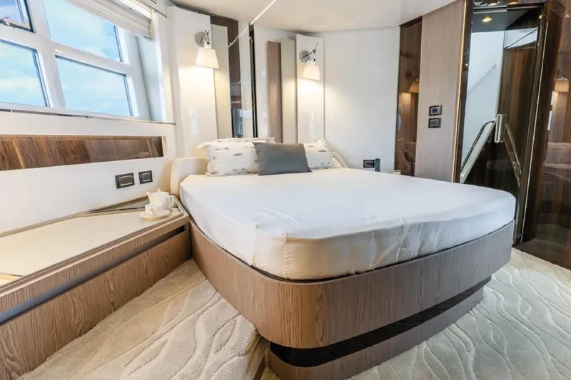 No Name Yacht Photos Pics Luxurious bedroom interior of 2019 Azimut S7 yacht with modern design and elegant furnishings.