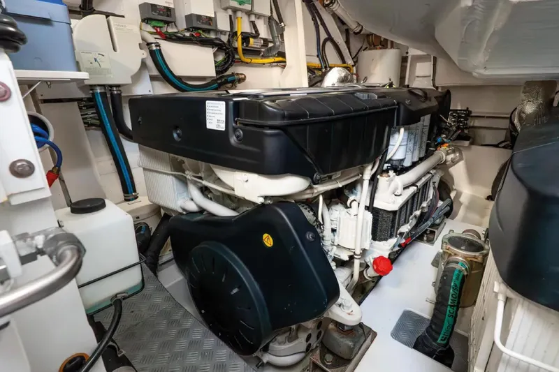 No Name Yacht Photos Pics Engine room of a 2019 Azimut S7 yacht, showcasing complex machinery and wiring.