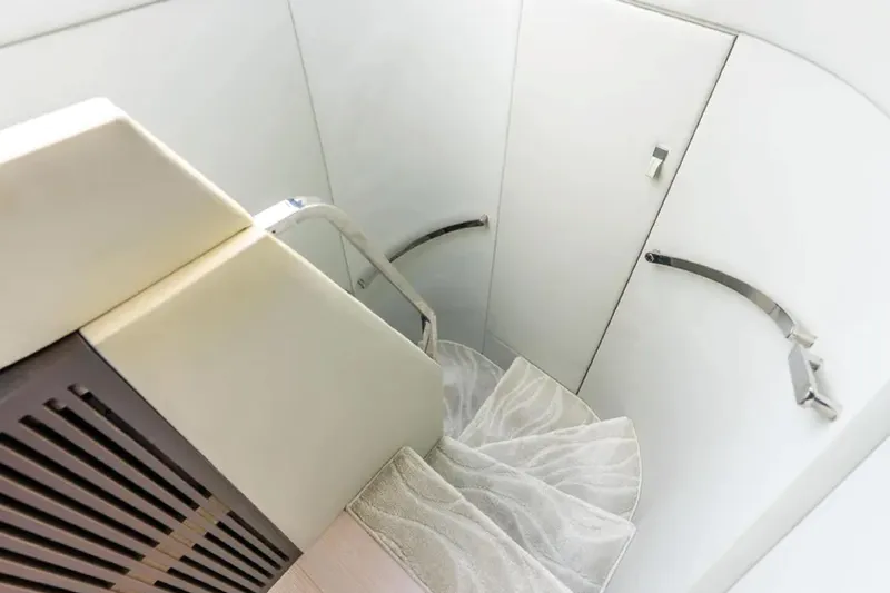 No Name Yacht Photos Pics Interior staircase of 2019 Azimut S7 yacht, featuring sleek design and modern materials.