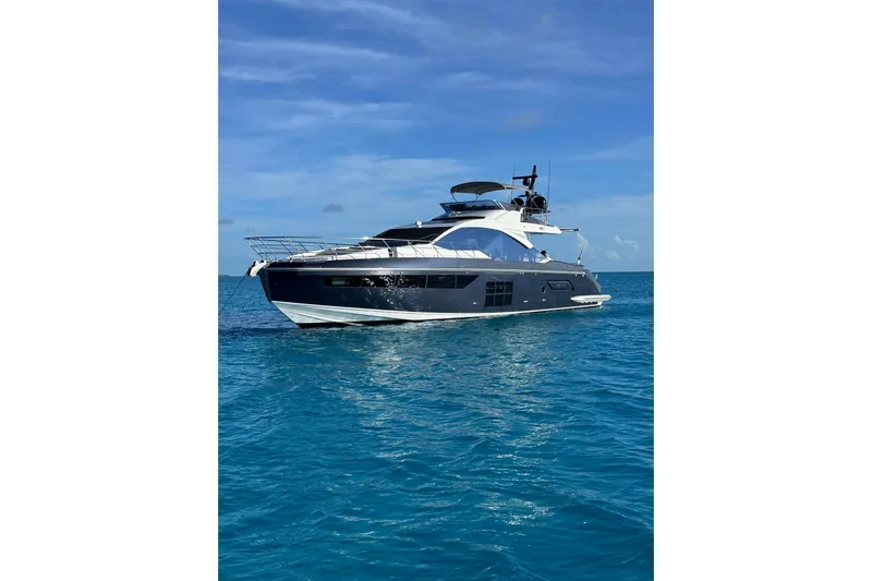 No Name Yacht Photos Pics Luxury 2019 Azimut S7 yacht cruising on clear blue ocean waters.