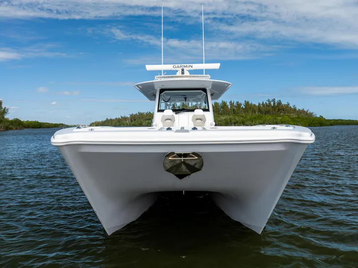  Yacht Photos Pics 2023 Freeman 43 boat on water, front view, clear sky background.