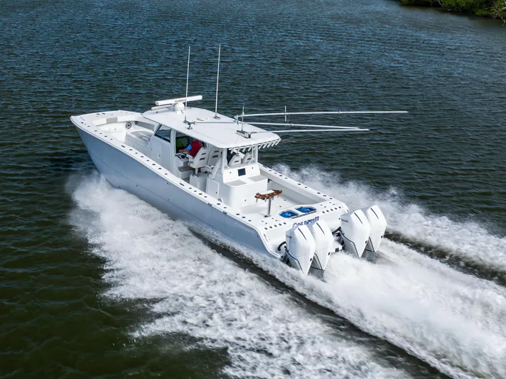  Yacht Photos Pics 2023 Freeman 43 boat cruising on water with powerful engines and sleek design.