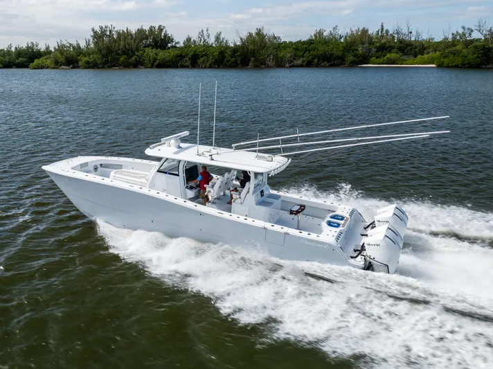  Yacht Photos Pics Freeman 43 boat cruising on water, 2023 model, with powerful engines and sleek design.