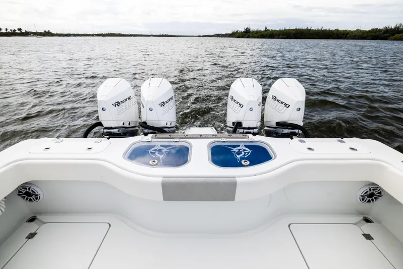  Yacht Photos Pics Freeman 43 boat with four powerful outboard engines on open water, 2023 model.