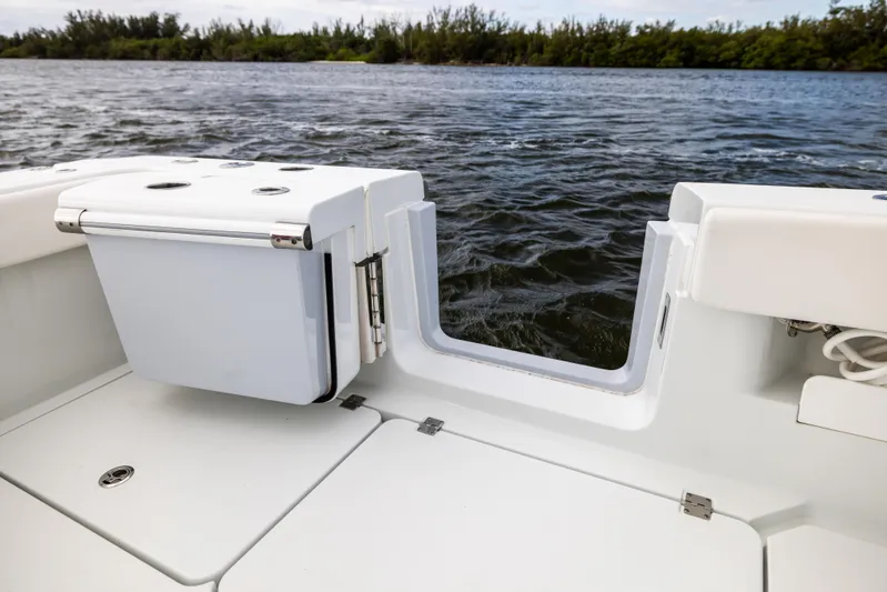  Yacht Photos Pics Freeman 43 boat deck with open transom door, 2023 model, near water.