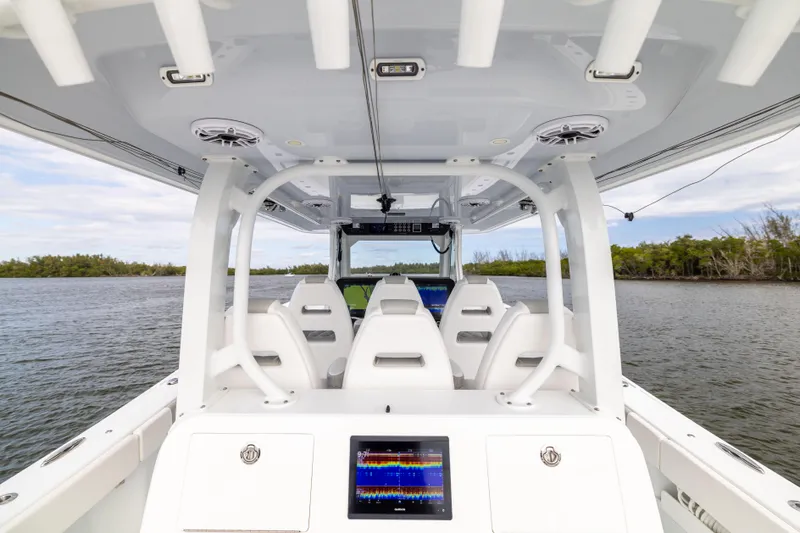  Yacht Photos Pics Interior view of 2023 Freeman 43 boat with modern seating and navigation system.