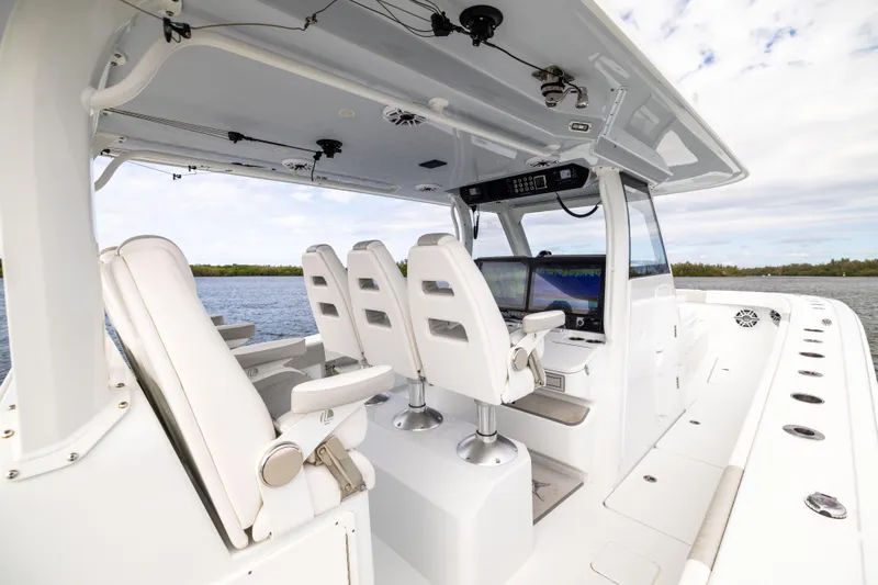  Yacht Photos Pics 2023 Freeman 43 boat interior with modern seating and navigation equipment.