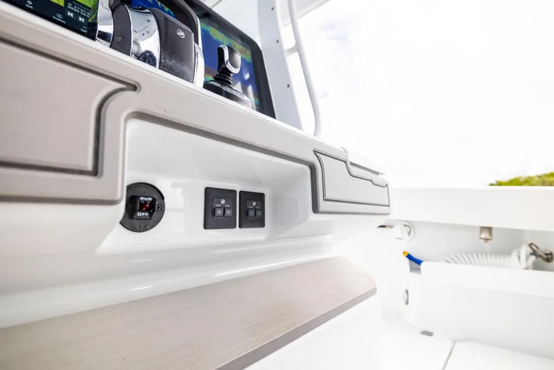  Yacht Photos Pics Control panel of 2023 Freeman 43 boat with modern switches and sleek design.