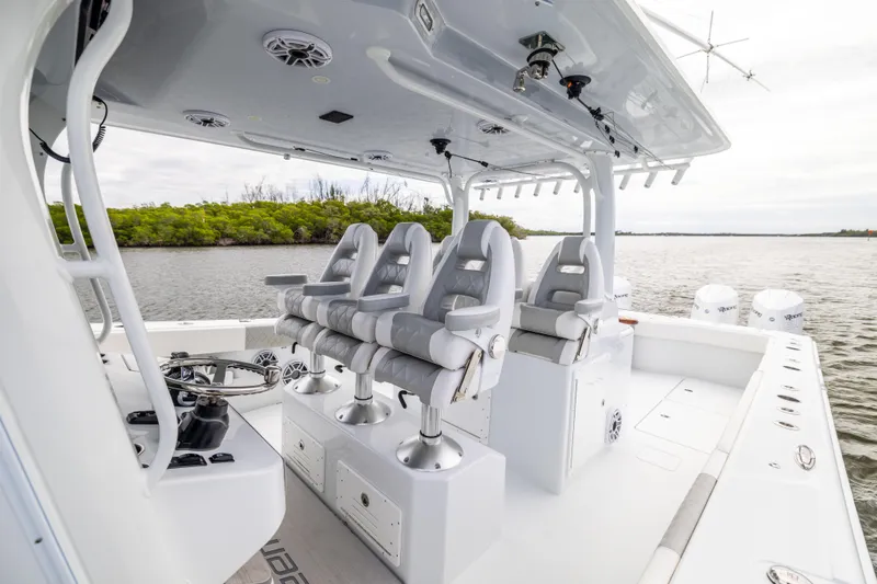  Yacht Photos Pics Luxury seating on a 2023 Freeman 43 boat, featuring sleek design and spacious layout.