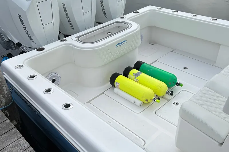  Yacht Photos Pics 2023 Invincible 36 Open Fisherman boat deck with scuba tanks and Mercury engines.