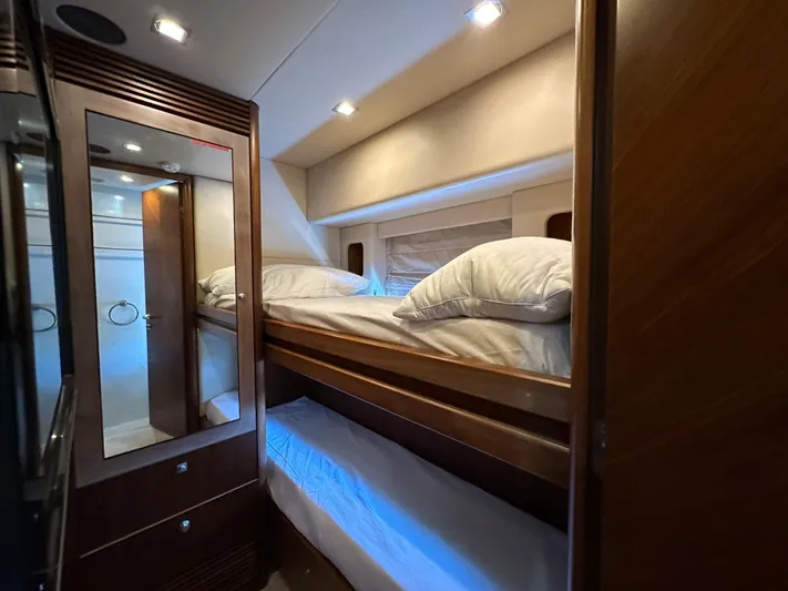 Low Profile Yacht Photos Pics Interior cabin of 2007 Sunseeker Predator 82 yacht with bunk beds.