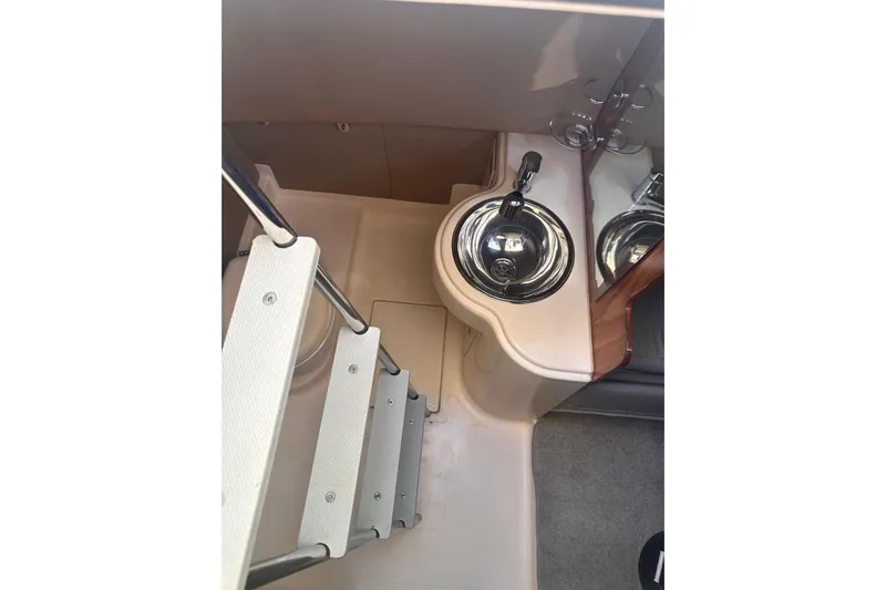 Splendor Yacht Photos Pics Interior of 2007 Azimut 55E yacht showing compact sink and stairs.