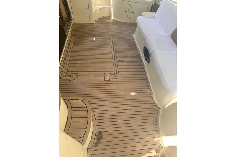 Splendor Yacht Photos Pics 2007 Azimut 55E yacht interior with elegant wooden flooring and comfortable seating.