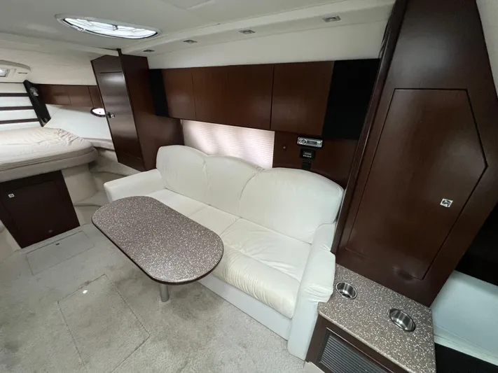  Yacht Photos Pics Interior of 2012 Cruisers Yachts 350 Express with white sofa and modern design.