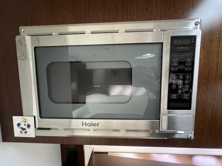  Yacht Photos Pics Haier microwave in 2012 Cruisers Yachts 350 Express kitchen area.