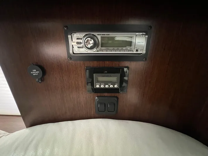  Yacht Photos Pics 2012 Cruisers Yachts 350 Express dashboard with Sony stereo system and controls.