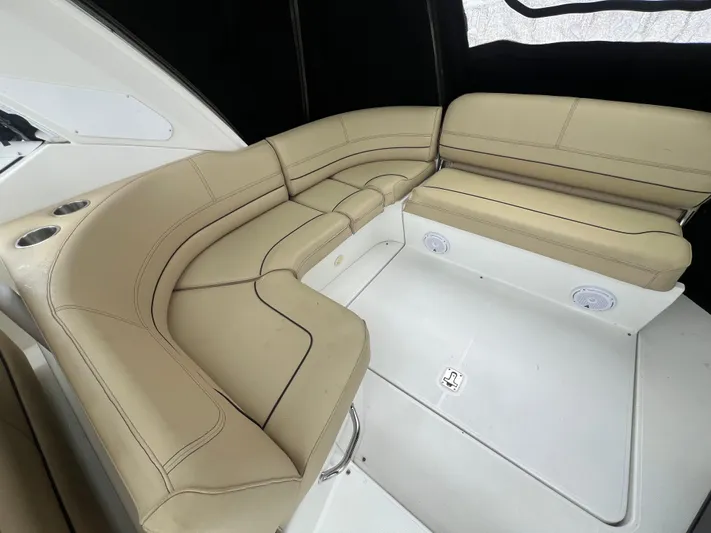  Yacht Photos Pics 2012 Cruisers Yachts 350 Express interior with beige leather seating.