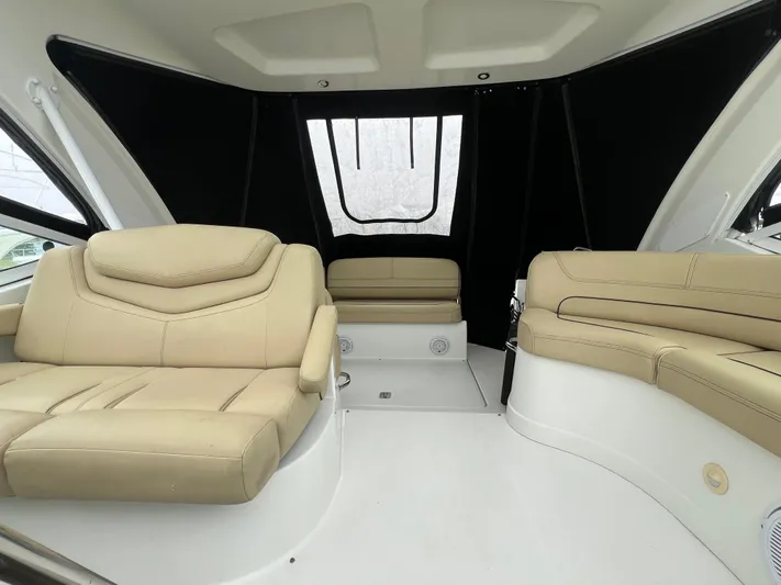  Yacht Photos Pics Interior of 2012 Cruisers Yachts 350 Express with beige leather seating.