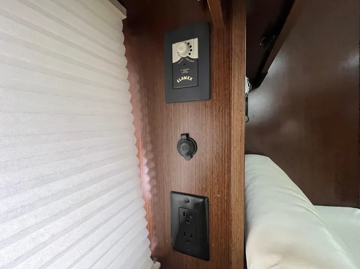  Yacht Photos Pics Interior of 2012 Cruisers Yachts 350 Express with electrical panel and outlets.