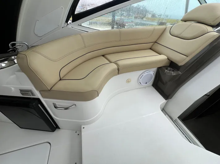  Yacht Photos Pics Luxurious seating area in 2012 Cruisers Yachts 350 Express boat interior.