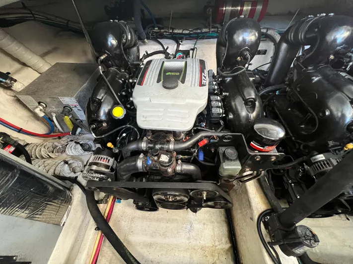  Yacht Photos Pics Engine compartment of 2012 Cruisers Yachts 350 Express, showcasing detailed mechanical components.