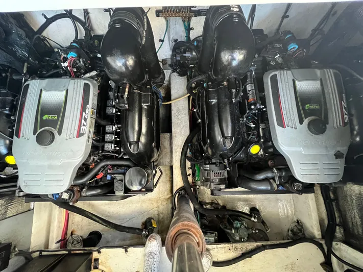  Yacht Photos Pics 2012 Cruisers Yachts 350 Express engine compartment with twin inboard motors.