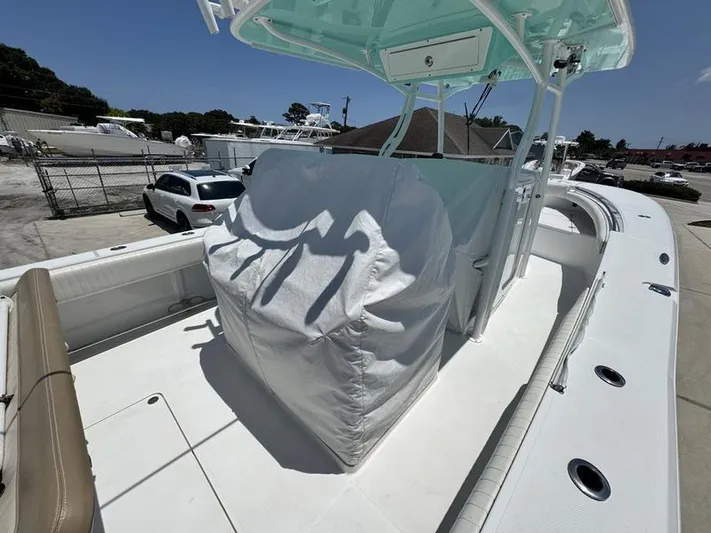  Yacht Photos Pics 2015 Southport 29 FE boat deck with covered console and seating area.