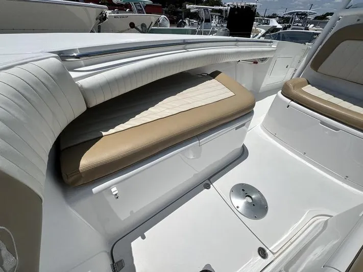  Yacht Photos Pics 2015 Southport 29 FE boat interior with cushioned seating and sleek design.