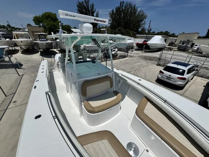  Yacht Photos Pics 2015 Southport 29 FE boat with Raymarine radar in a marina setting.