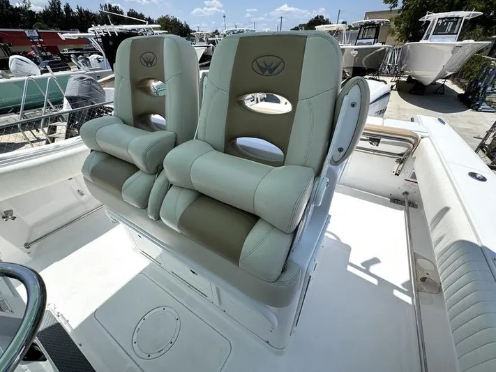  Yacht Photos Pics 2015 Southport 29 FE boat with dual cushioned seats on deck.