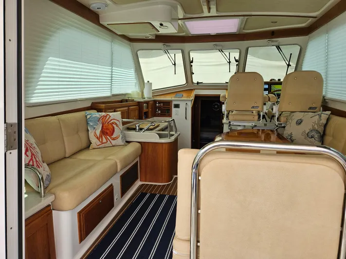 Liberty Call Yacht Photos Pics Looking forward from the cockpit, port with Oceanair shades down and canvas on the forward windows