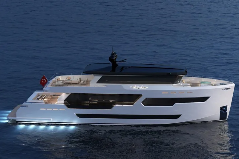  Yacht Photos Pics Luxurious 2027 KRC Yacht Dolphin 100 cruising on serene ocean waters at night.