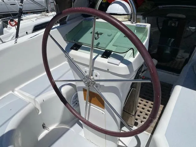 Rogue Fun Yacht Photos Pics Steering wheel of a 2001 Beneteau Oceanis 44 CC sailboat cockpit.