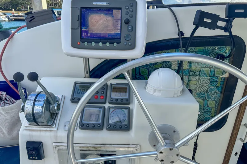 Mystic Yacht Photos Pics Steering wheel and navigation equipment on 2001 Privilege 435 yacht.