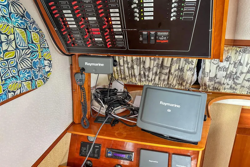 Mystic Yacht Photos Pics Control panel and Raymarine equipment on 2001 Privilege 435 yacht interior.