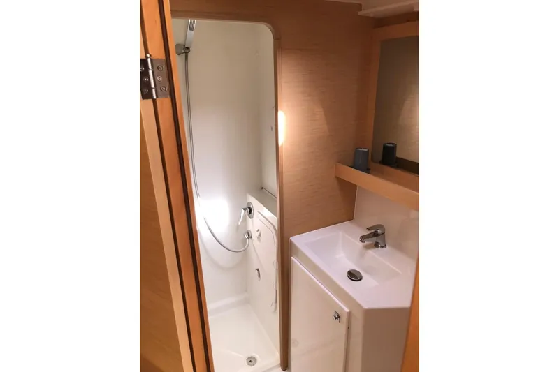  Yacht Photos Pics Compact bathroom in 2016 Lagoon 42 yacht with shower and sink.
