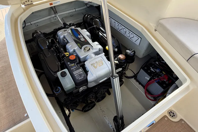  Yacht Photos Pics Engine compartment of 2023 Chris-Craft Launch 28 GT, showcasing powerful V8 engine.