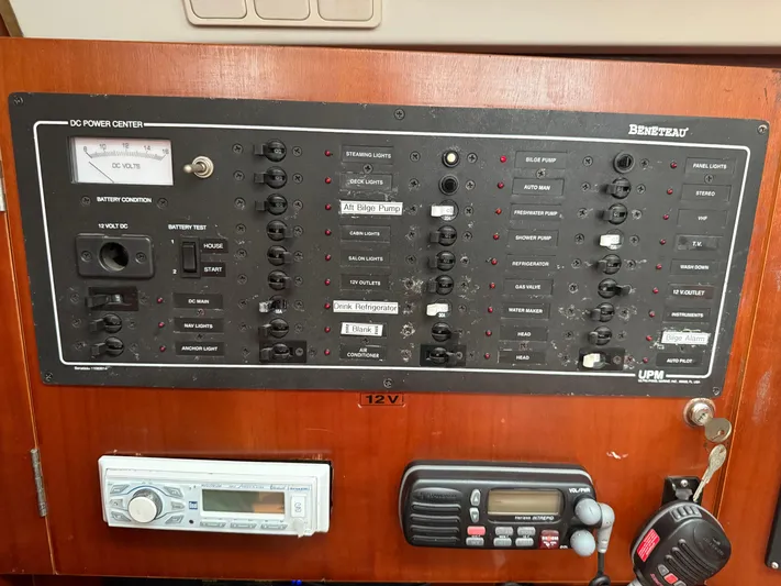 Traveler Yacht Photos Pics Electrical control panel on a 2002 Beneteau 473 sailboat, featuring various switches and gauges.