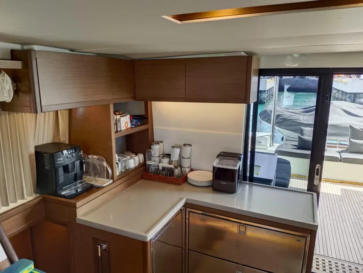  Yacht Photos Pics Modern kitchen interior on 2018 Lagoon 50 yacht with coffee maker and ocean view.
