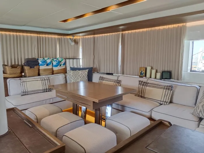  Yacht Photos Pics Luxurious interior of a 2018 Lagoon 50 yacht with elegant seating and decor.