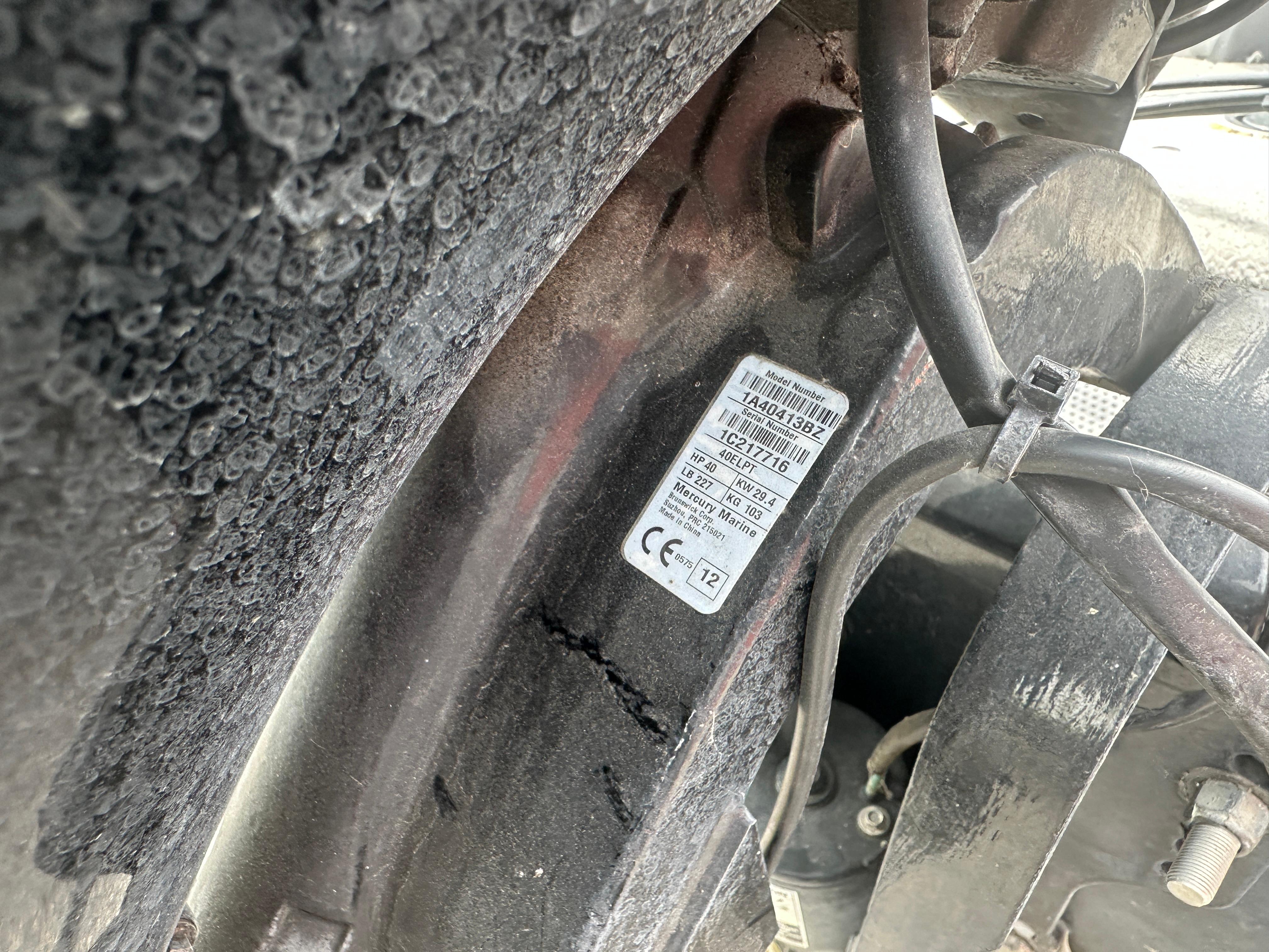 2013 Tracker Super Guide V-16 SC boat engine label with model and specifications.