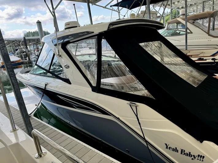  Yacht Photos Pics 2018 Sea Ray SLX 310 boat docked at marina with Yeah Baby!!! decal.