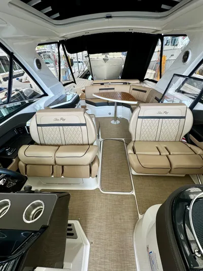  Yacht Photos Pics 2018 Sea Ray SLX 310 interior with luxurious seating and modern design.