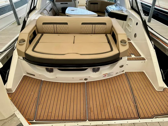 Yacht Photos Pics 2018 Sea Ray SLX 310 boat with tan seating and teak flooring.
