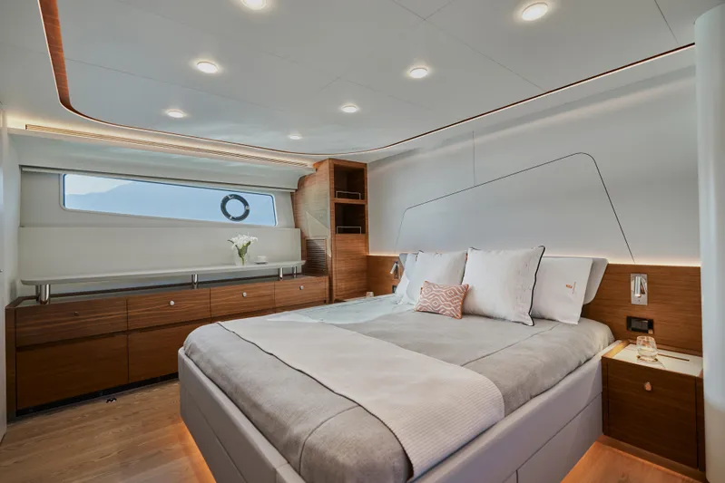  Yacht Photos Pics Luxurious 2024 CL Yachts CLB65 bedroom with modern design and elegant wood accents.