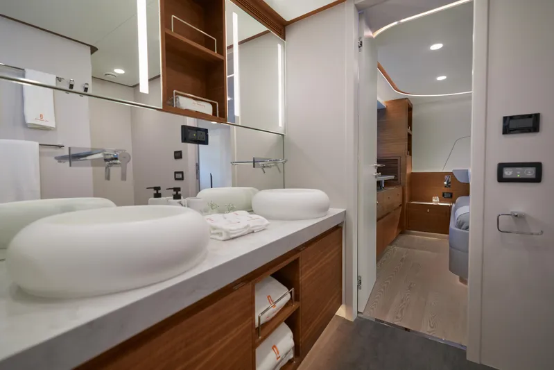  Yacht Photos Pics Luxurious bathroom interior of 2024 CL Yachts CLB65, featuring modern fixtures and elegant design.