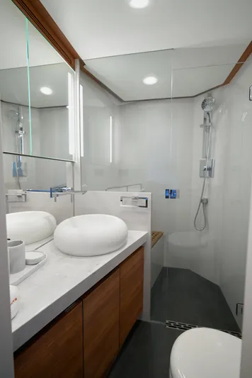  Yacht Photos Pics Modern bathroom in 2024 CL Yachts CLB65, featuring sleek design and elegant fixtures.